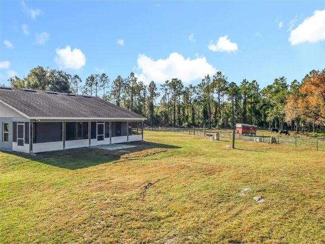 6100 WINNING WOOD TRAIL, De Leon Springs, FL 32130