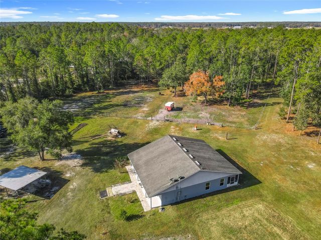 6100 WINNING WOOD TRAIL, De Leon Springs, FL 32130