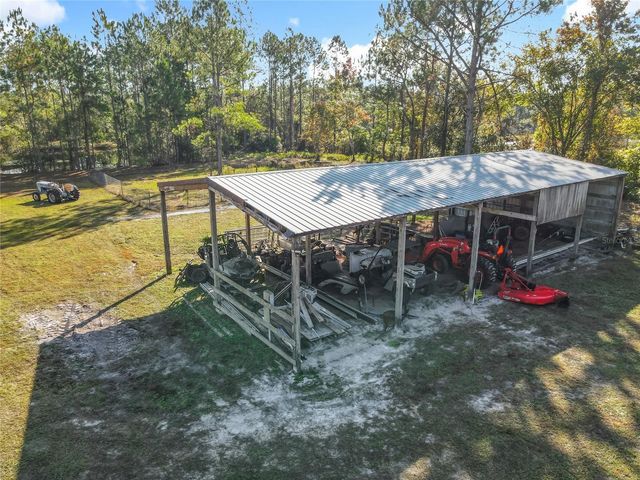 6100 WINNING WOOD TRAIL, De Leon Springs, FL 32130