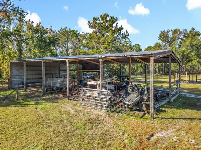 6100 WINNING WOOD TRAIL, De Leon Springs, FL 32130