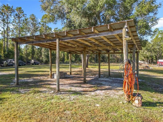 6100 WINNING WOOD TRAIL, De Leon Springs, FL 32130