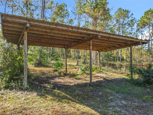 6100 WINNING WOOD TRAIL, De Leon Springs, FL 32130