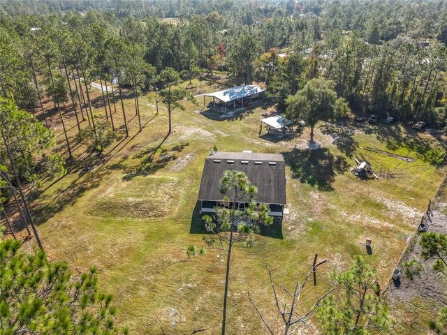 6100 WINNING WOOD TRAIL, De Leon Springs, FL 32130