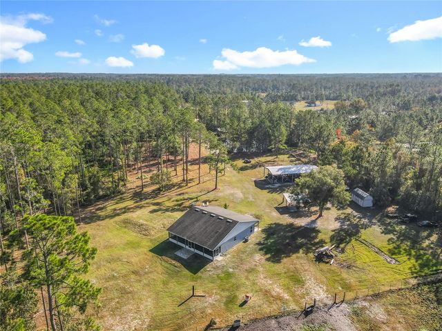 6100 WINNING WOOD TRAIL, De Leon Springs, FL 32130