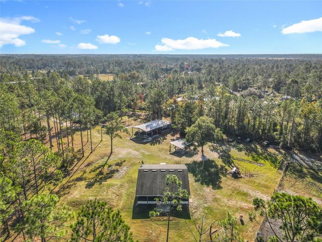6100 WINNING WOOD TRAIL, De Leon Springs, FL 32130