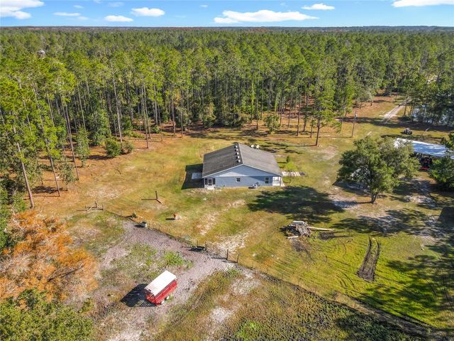 6100 WINNING WOOD TRAIL, De Leon Springs, FL 32130