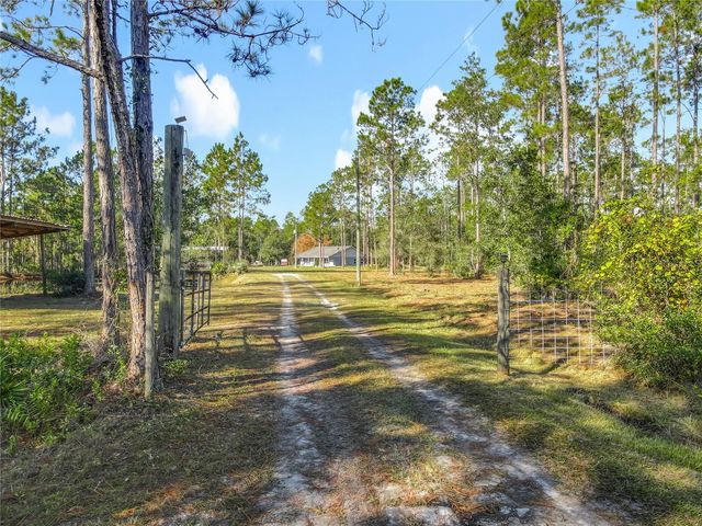 6100 WINNING WOOD TRAIL, De Leon Springs, FL 32130