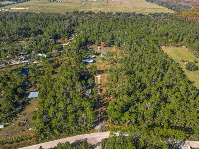 6100 WINNING WOOD TRAIL, De Leon Springs, FL 32130