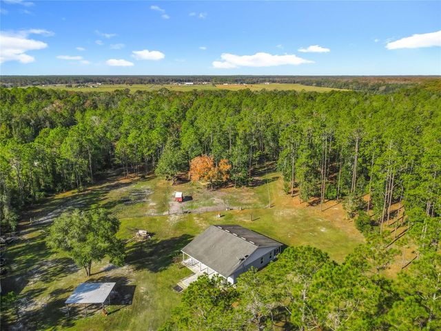 6100 WINNING WOOD TRAIL, De Leon Springs, FL 32130