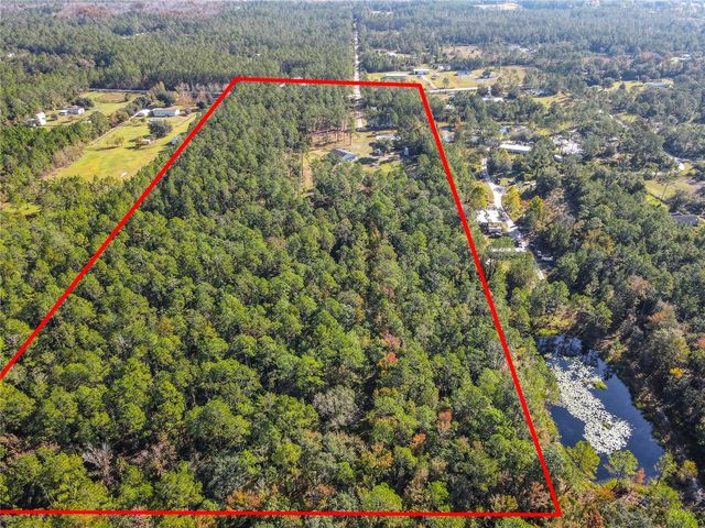 6100 WINNING WOOD TRAIL, De Leon Springs, FL 32130