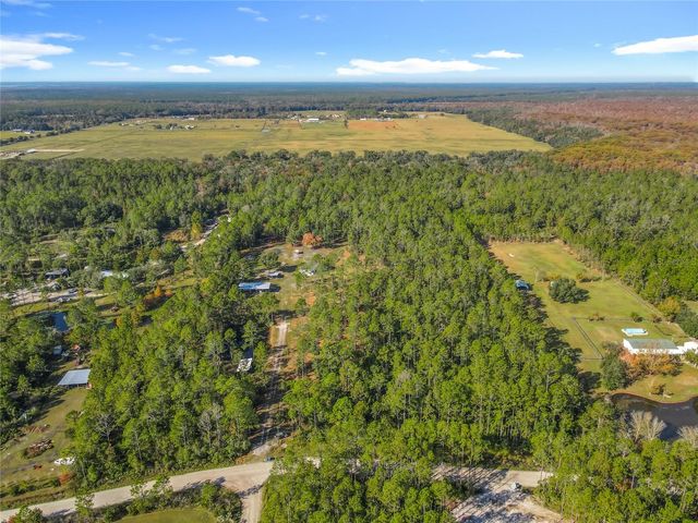 6100 WINNING WOOD TRAIL, De Leon Springs, FL 32130