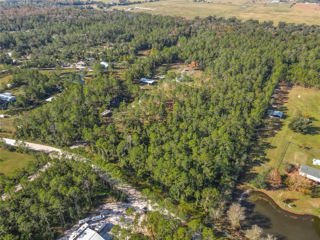 6100 WINNING WOOD TRAIL, De Leon Springs, FL 32130
