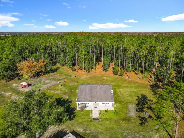 6100 WINNING WOOD TRAIL, De Leon Springs, FL 32130