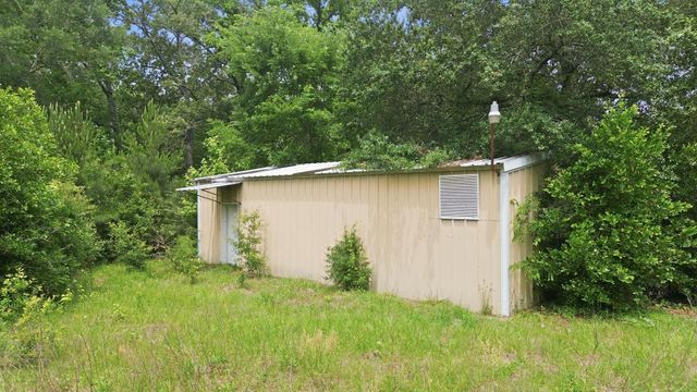 124 White Oak Drive N, Woodbranch, TX 77357