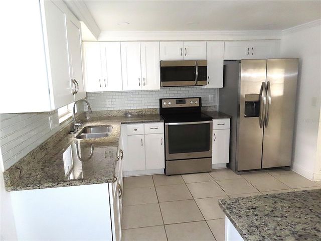 3908 BEECHWOOD BOULEVARD, Tampa, FL 33619