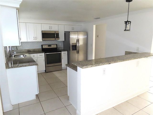 3908 BEECHWOOD BOULEVARD, Tampa, FL 33619