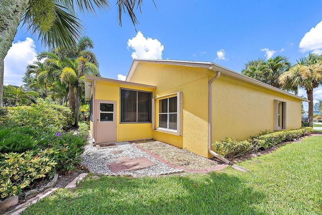 119 Hammocks Drive, Greenacres, FL 33413
