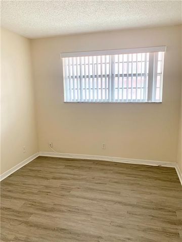 680 Tennis Club Drive Unit 102, Fort Lauderdale, FL 33311