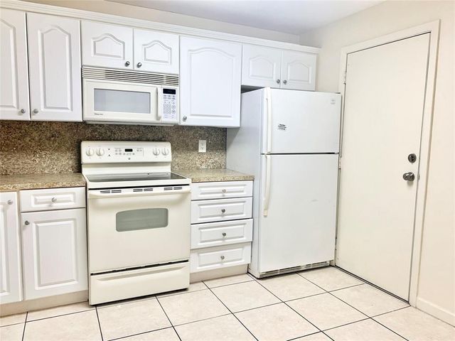 680 Tennis Club Drive Unit 102, Fort Lauderdale, FL 33311