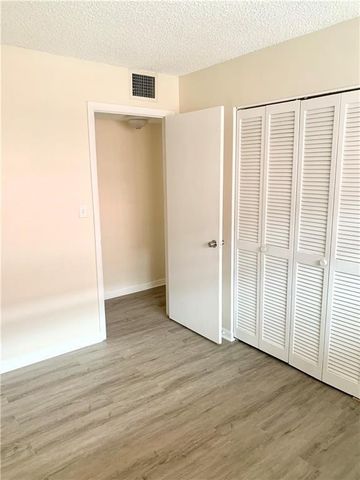 680 Tennis Club Drive Unit 102, Fort Lauderdale, FL 33311