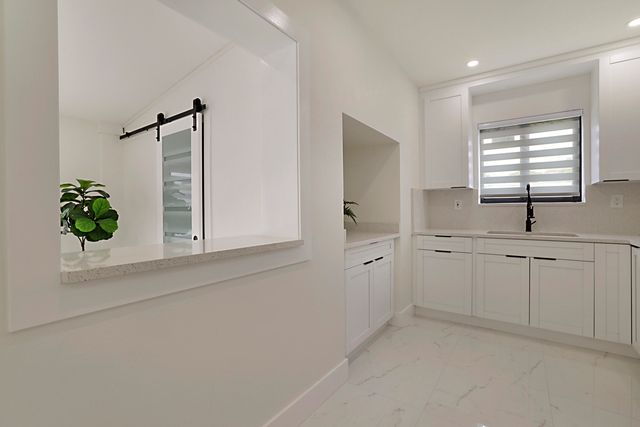 421 FONTANA Drive, Palm Springs, FL 33461