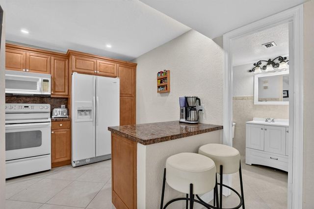 2460 DEER CREEK COUNTRY CLUB Boulevard 206-A, Deerfield Beach, FL 33442