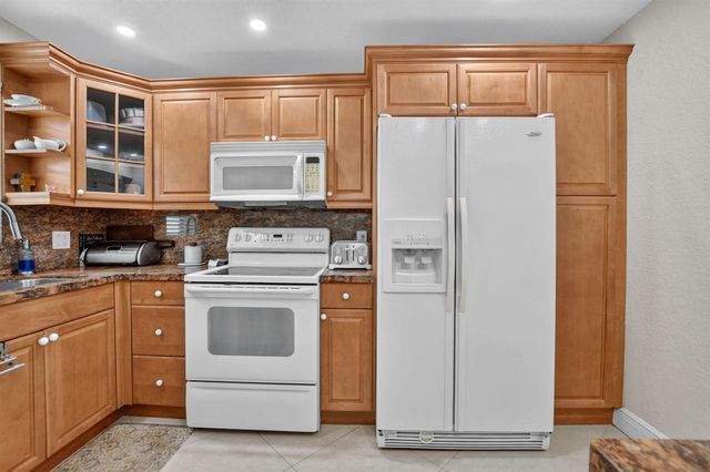 2460 DEER CREEK COUNTRY CLUB Boulevard 206-A, Deerfield Beach, FL 33442