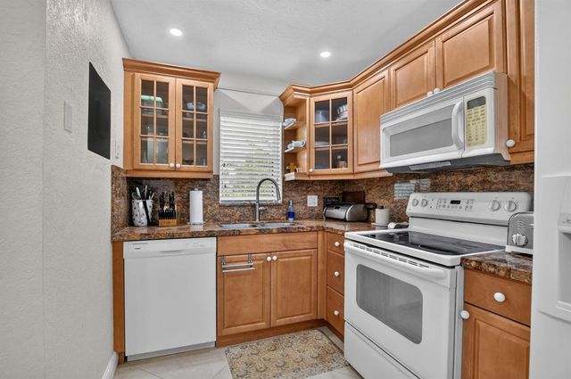 2460 DEER CREEK COUNTRY CLUB Boulevard 206-A, Deerfield Beach, FL 33442