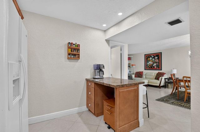 2460 DEER CREEK COUNTRY CLUB Boulevard 206-A, Deerfield Beach, FL 33442