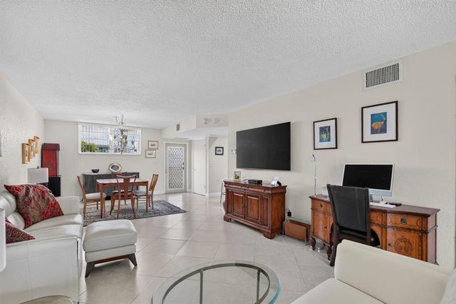 2460 DEER CREEK COUNTRY CLUB Boulevard 206-A, Deerfield Beach, FL 33442