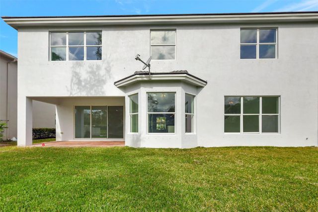 9334 Madewood Court, Royal Palm Beach, FL 33411