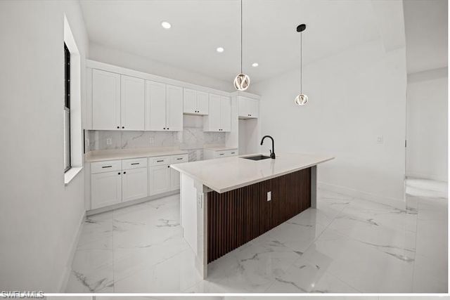 1033 Plymouth ST E, Lehigh Acres, FL 33974