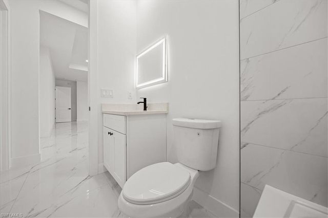 1033 Plymouth ST E, Lehigh Acres, FL 33974