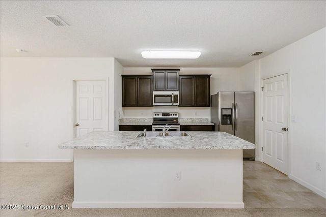 155 Sutherland Drive SW, Palm Bay, FL 32908