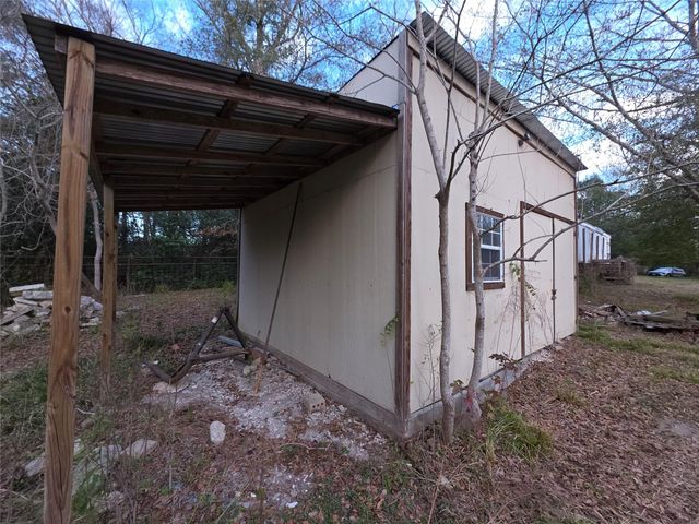 1302 N Lake Dr, Splendora, TX 77372