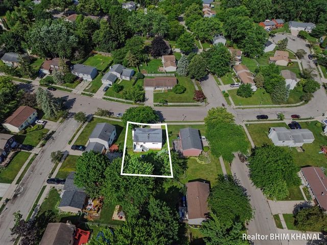 6007 Rockingham Drive, Lansing, MI 48911