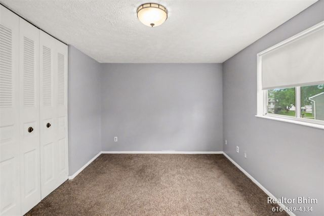 6007 Rockingham Drive, Lansing, MI 48911