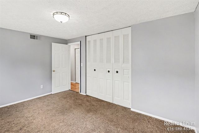 6007 Rockingham Drive, Lansing, MI 48911