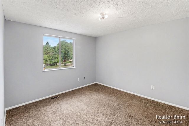 6007 Rockingham Drive, Lansing, MI 48911