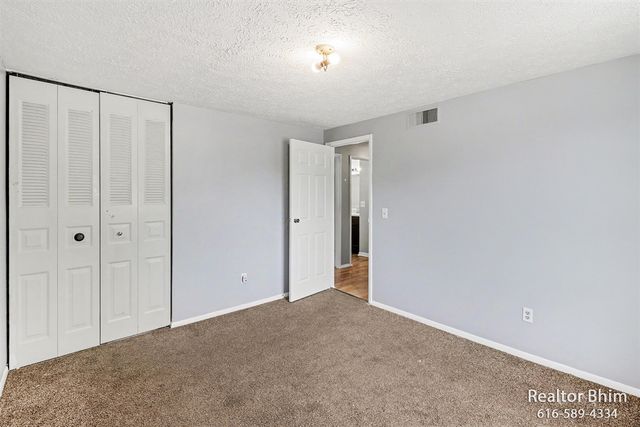 6007 Rockingham Drive, Lansing, MI 48911