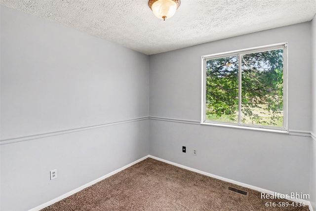 6007 Rockingham Drive, Lansing, MI 48911