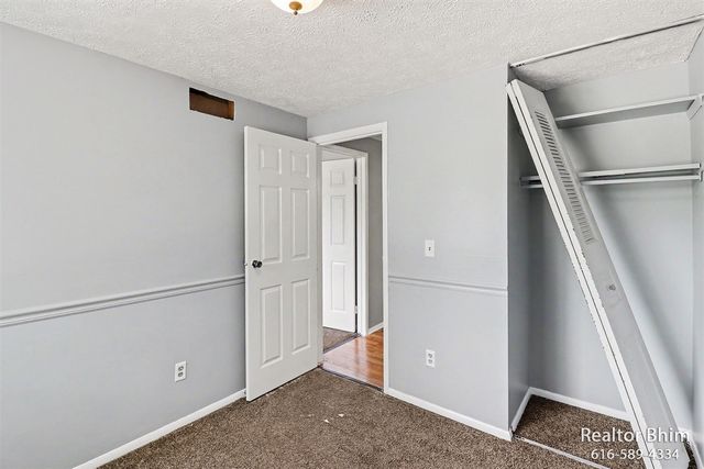 6007 Rockingham Drive, Lansing, MI 48911
