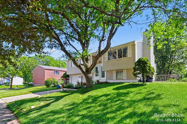 6007 Rockingham Drive, Lansing, MI 48911