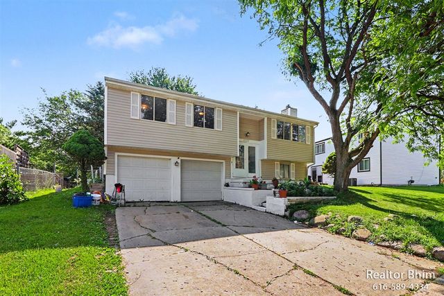 6007 Rockingham Drive, Lansing, MI 48911