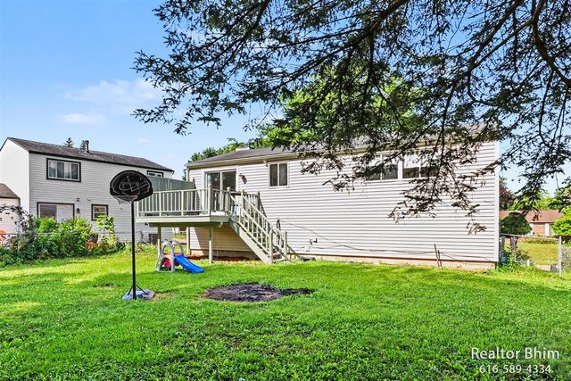 6007 Rockingham Drive, Lansing, MI 48911