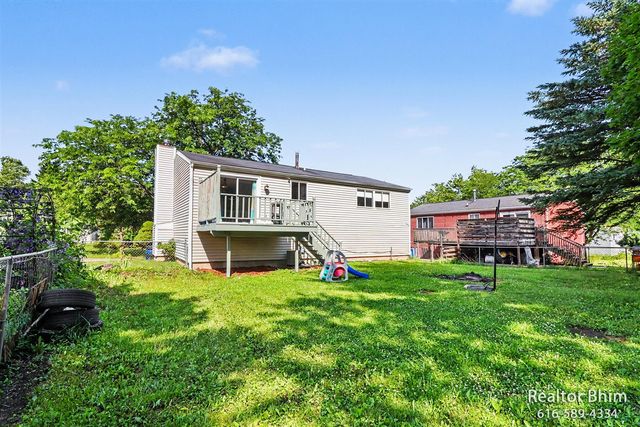 6007 Rockingham Drive, Lansing, MI 48911