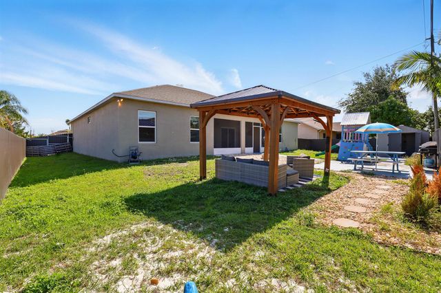 1041 SW Dartmouth Avenue, Port St Lucie, FL 34953