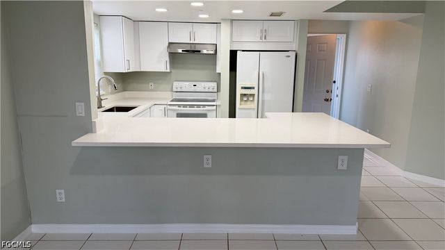28 Cosmopolitan DR 13, Lehigh Acres, FL 33936