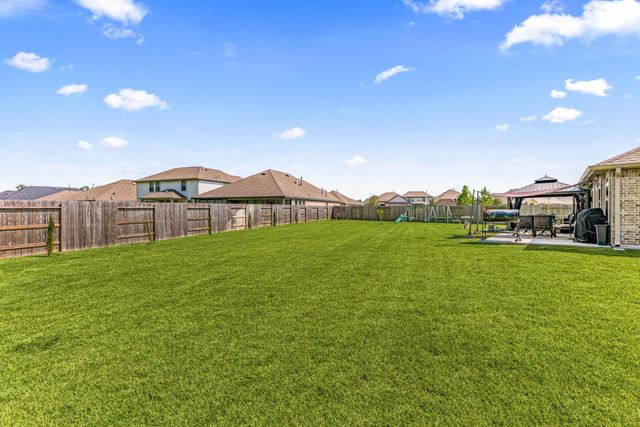 23412 Sentosa Bluff Court, New Caney, TX 77357