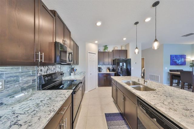 15426 WICKED STRONG STREET, Sun City Center, FL 33573